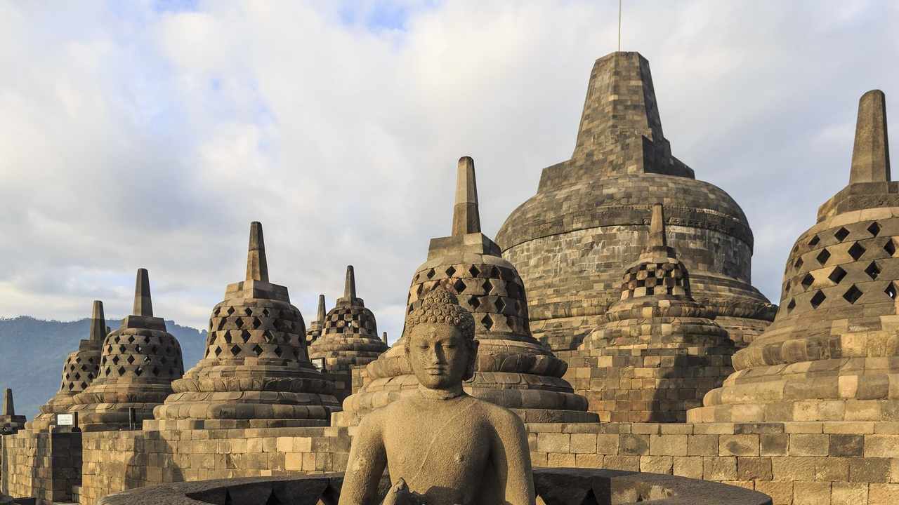 Bell-shaped stupas on the terraces of Borobudur Temple, Central Java — Indonesia visa guide