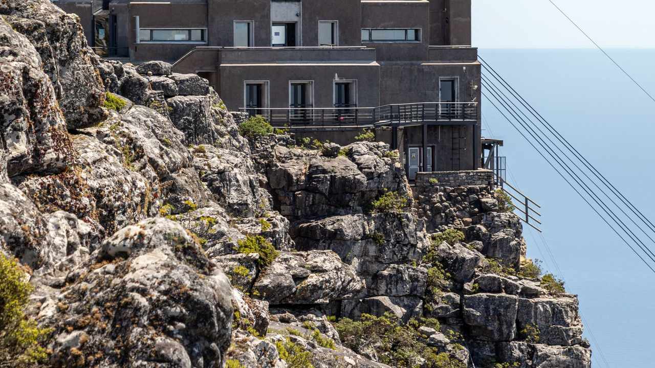 Table Mountain and its cableway station above Cape Town, South Africa